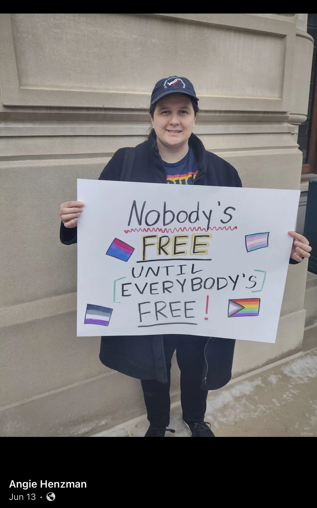 A Facebook screenshot labeled Angie Henzman shows a Pride-related image containing this sign and flags.