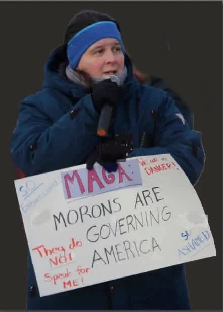 An anonymous photo shows an unidentified person holding this sign.