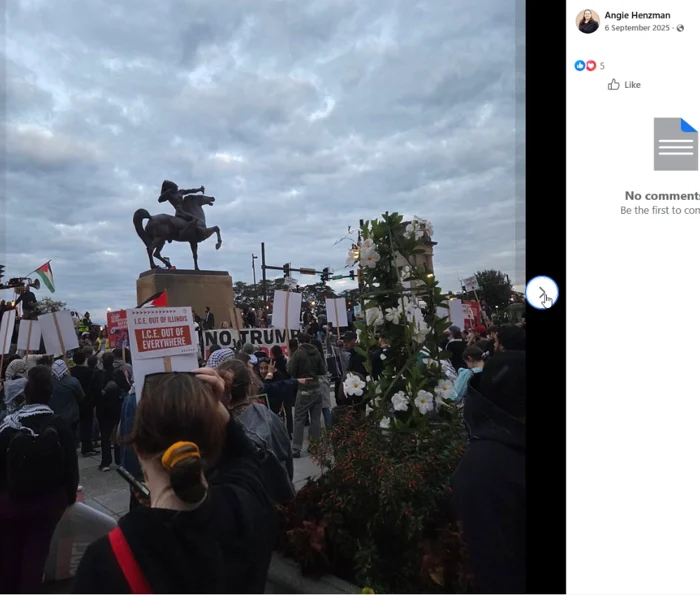 A crowd gathers beside an equestrian statue, with a Palestinian flag and several placards visible. A central placard calls for ICE out of Illinois and everywhere.