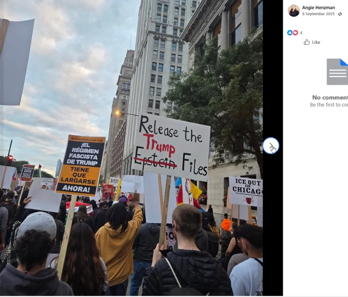 A street crowd between downtown buildings holds protest placards. Visible signs include an ICE OUT OF CHICAGO placard and signs about Trump and Epstein files.