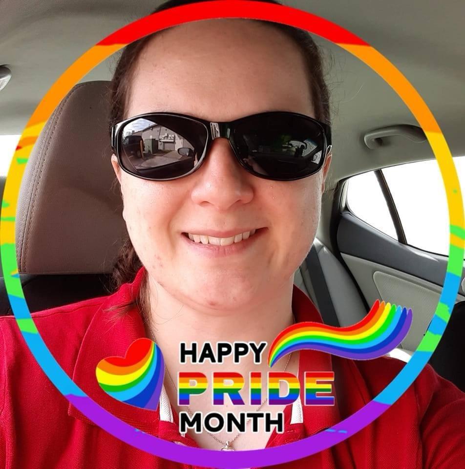 A supplied portrait photo inside a rainbow frame with a rainbow heart and the words HAPPY PRIDE MONTH.
