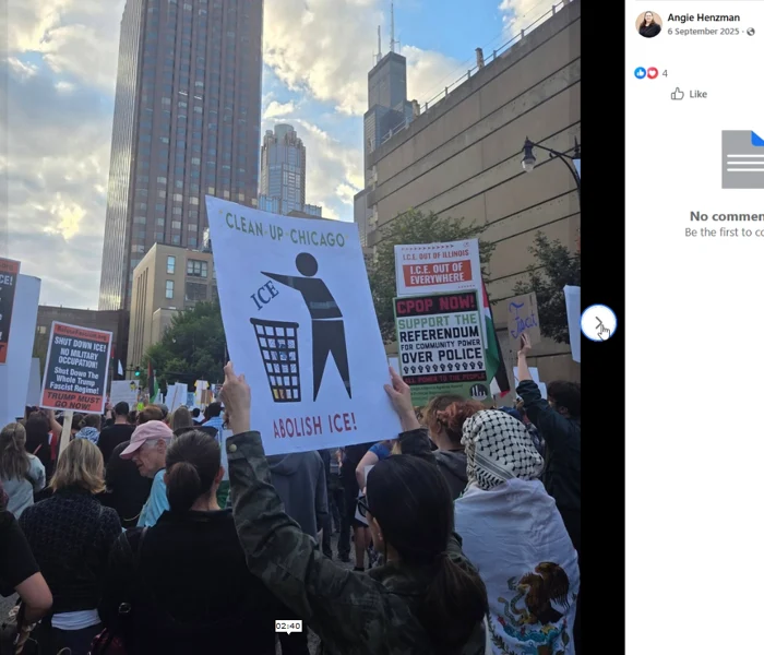 Facebook viewer screenshot of a downtown Chicago crowd holding a “CLEAN-UP CHICAGO / ABOLISH ICE!” placard, with high-rise buildings behind the rally.